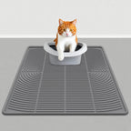 Pet silicone cat litter pad; Pet pad silicone cat litter pad; The cat is rubbing its feet on the mat. Leak-proof cat litter pad Easy-to-clean pet waterproof pad