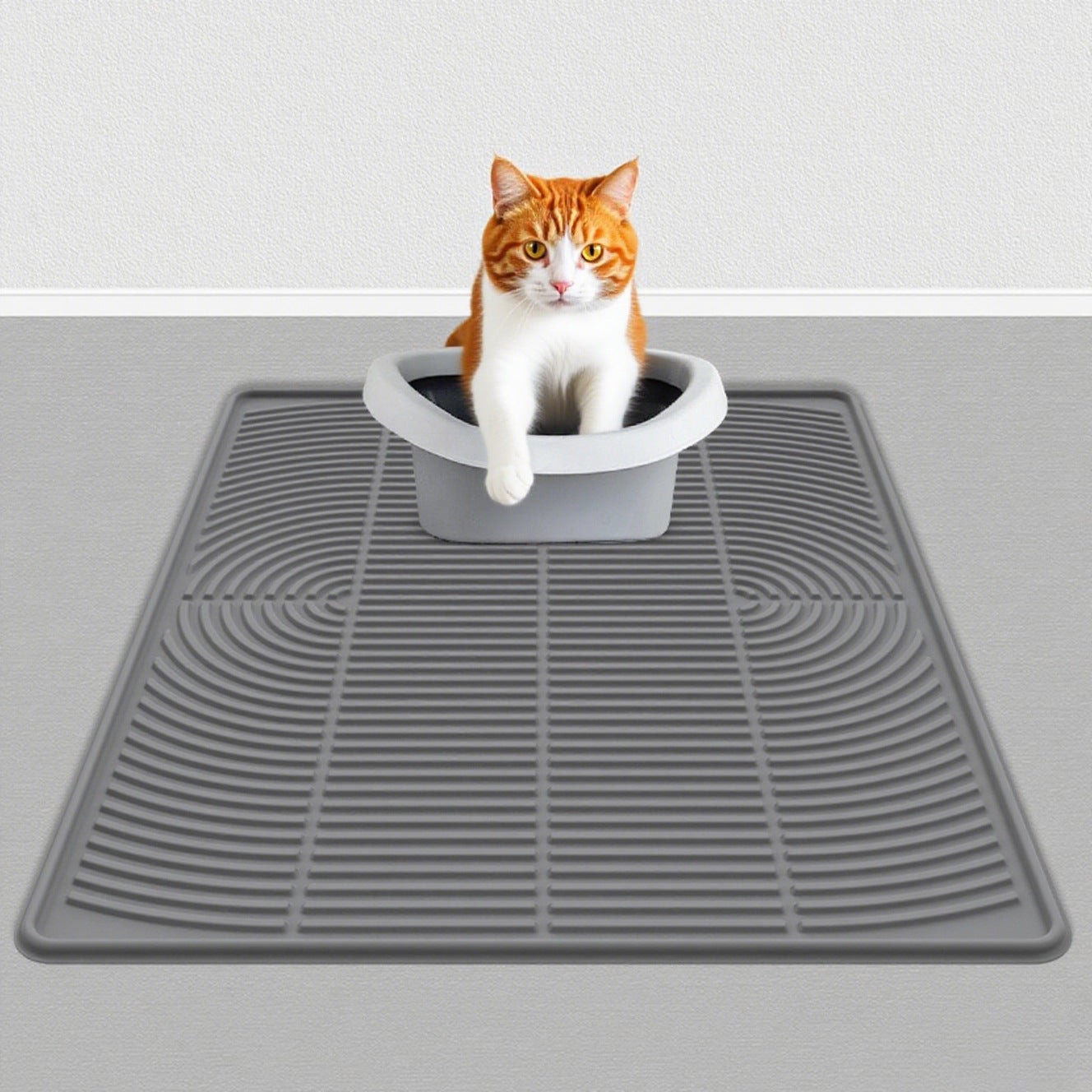 Pet silicone cat litter pad; Pet pad silicone cat litter pad; The cat is rubbing its feet on the mat. Leak-proof cat litter pad Easy-to-clean pet waterproof pad
