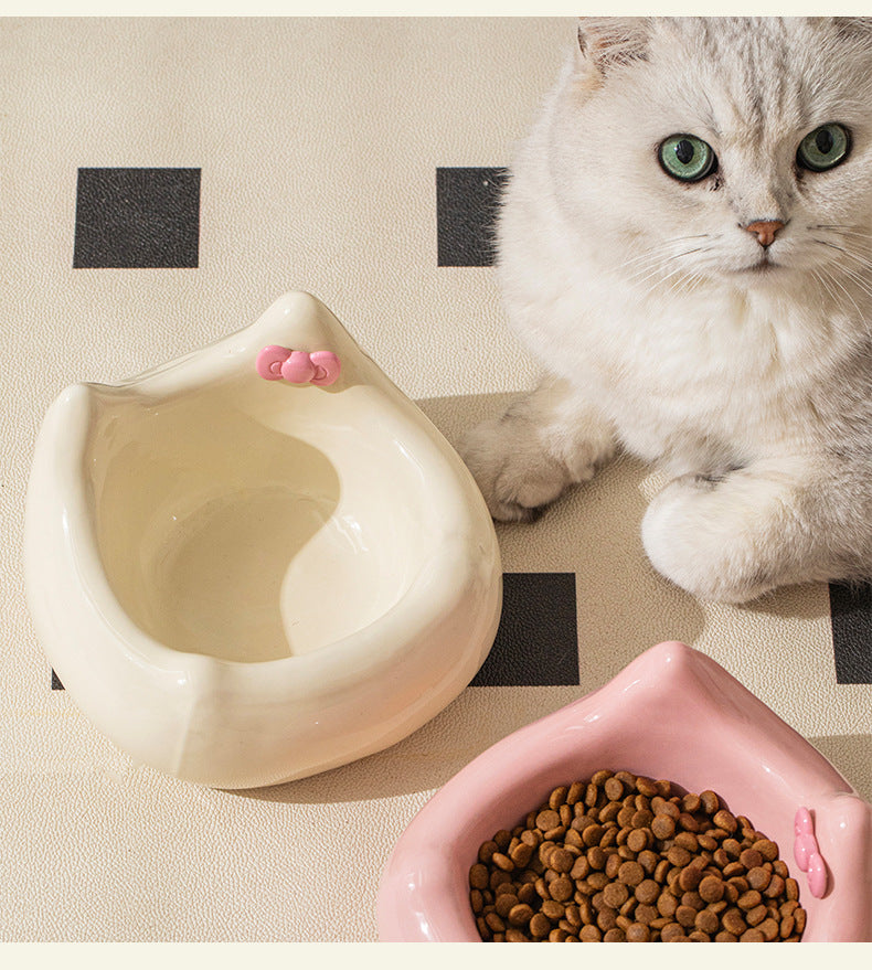 Ceramic pet feeding bowl; It can hold pet food and water. Ceramic products are heavy and not easy to be knocked over. A pet food bowl with a raised neck guard at the bottom