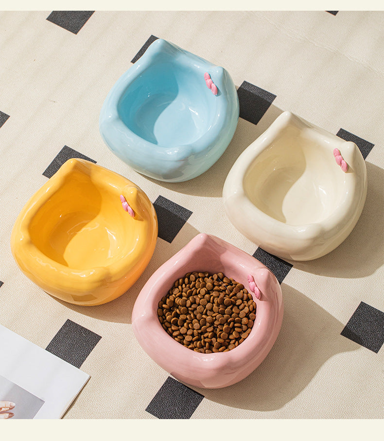 Ceramic pet feeding bowl; It can hold pet food and water. Ceramic products are heavy and not easy to be knocked over. A pet food bowl with a raised neck guard at the bottom